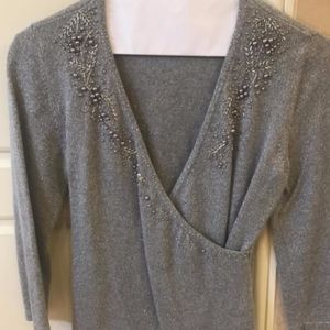 Festive Holiday silver sweater with detail.